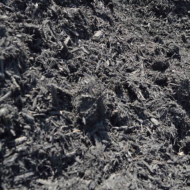 Premium Mulch — Black at the Mulch N' More yard in Exeter, Rhode Island